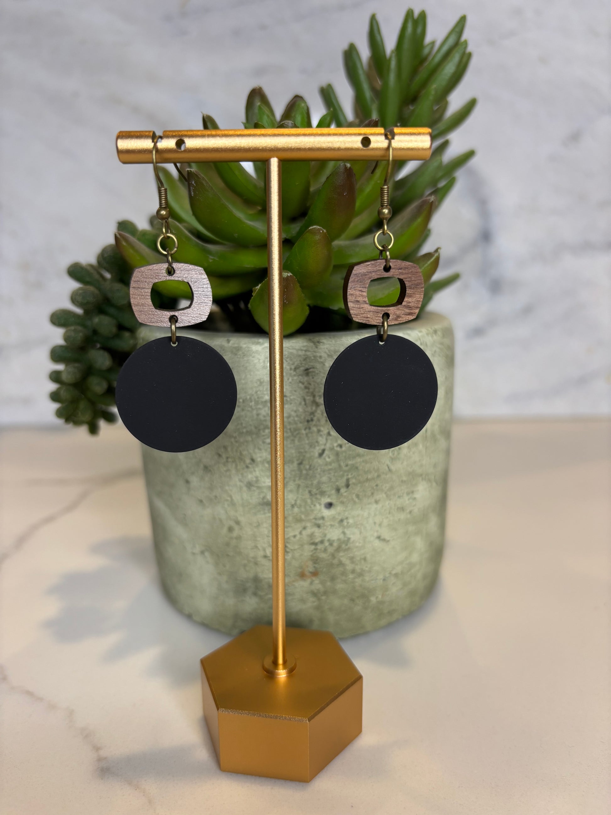 Black circle metal and cutout wood square earrings