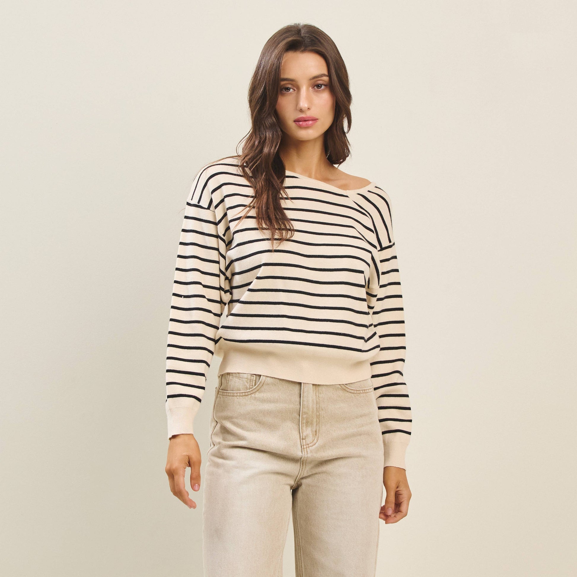 Asymmetric neckline striped sweater
