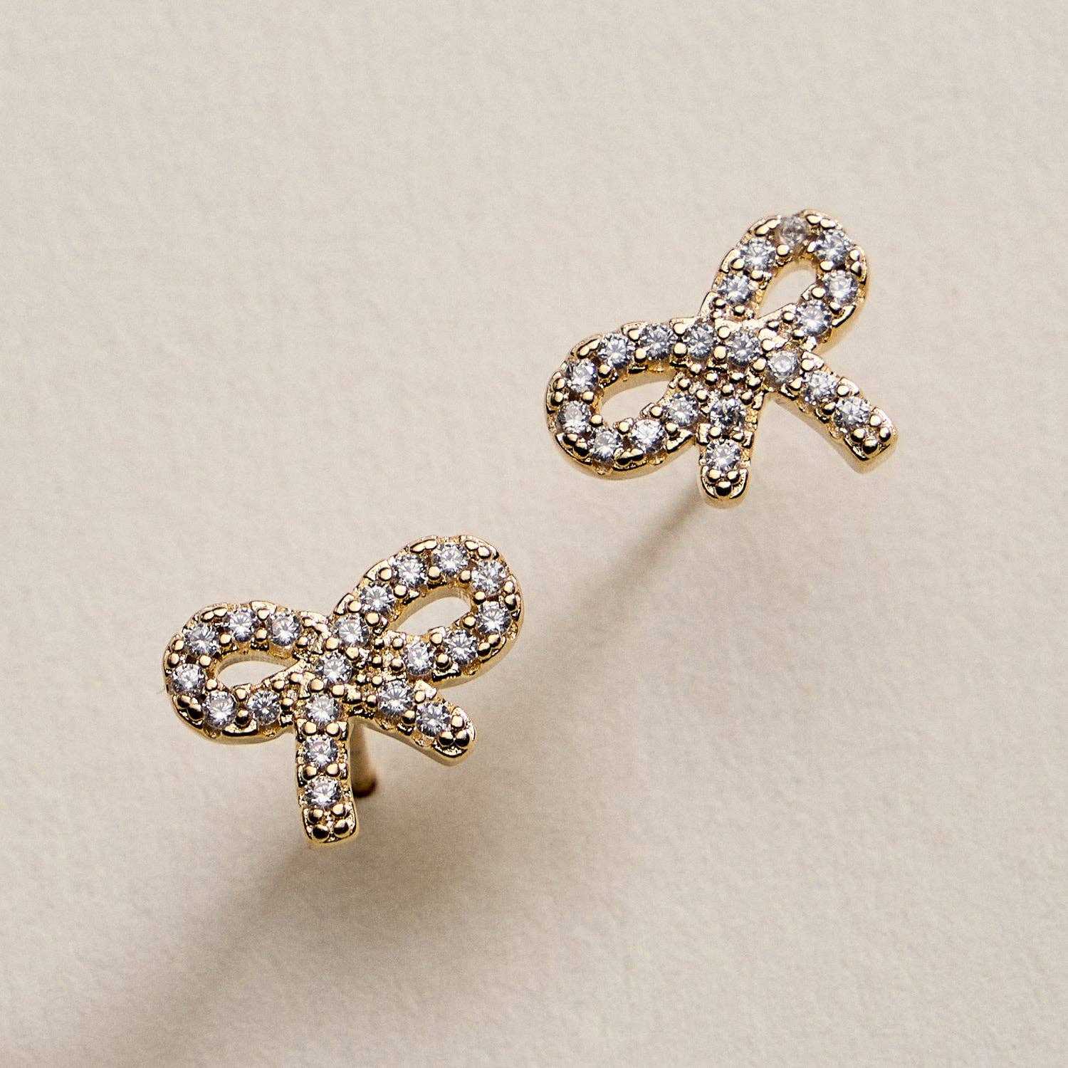 Gold Filled Bow Stud Earrings with Sparkling CZ Accents