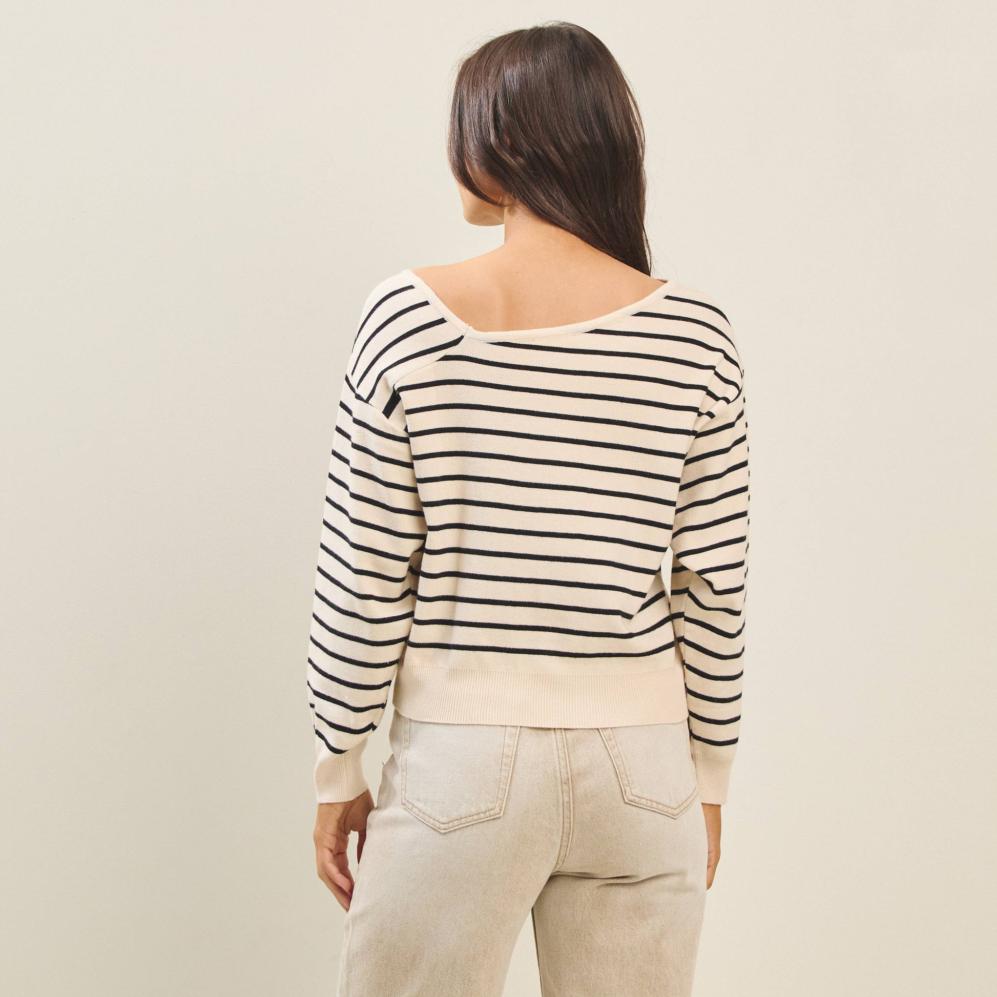 Asymmetric neckline striped sweater