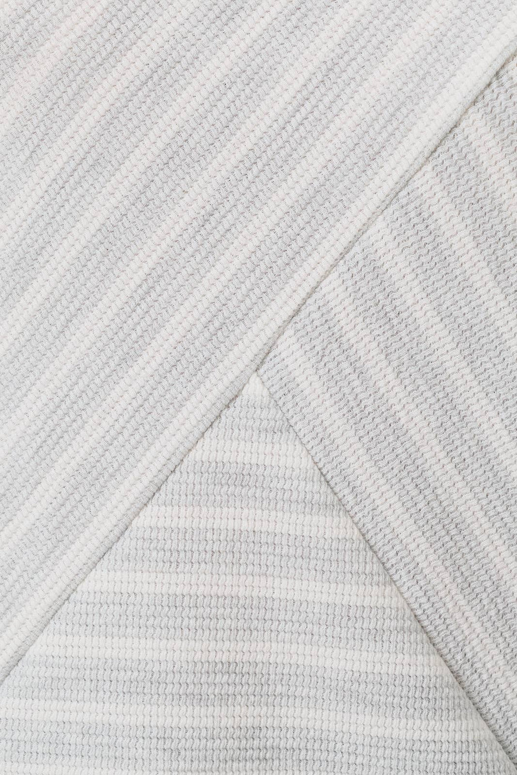 CREW NECK SLEEVELESS DIAGONAL PANEL STRIPE TOP