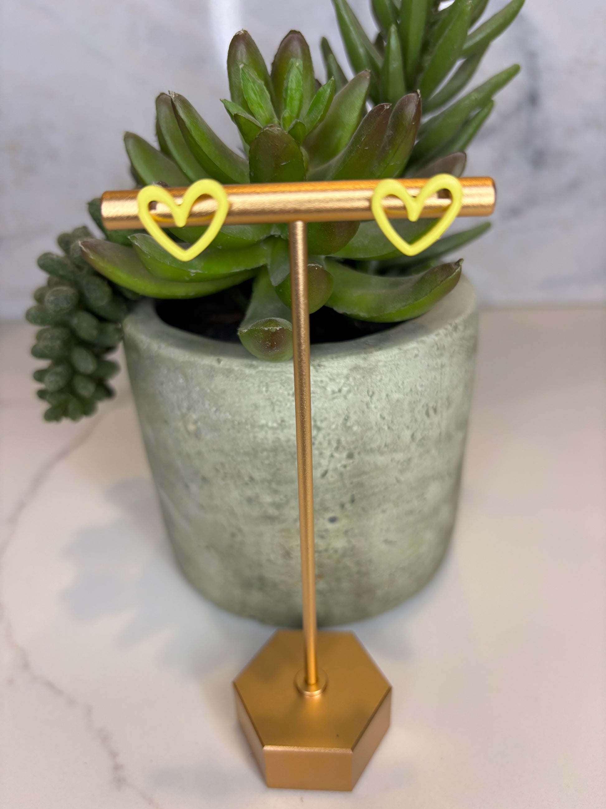 Yellow Metal Cutout Heart Stud Earrings