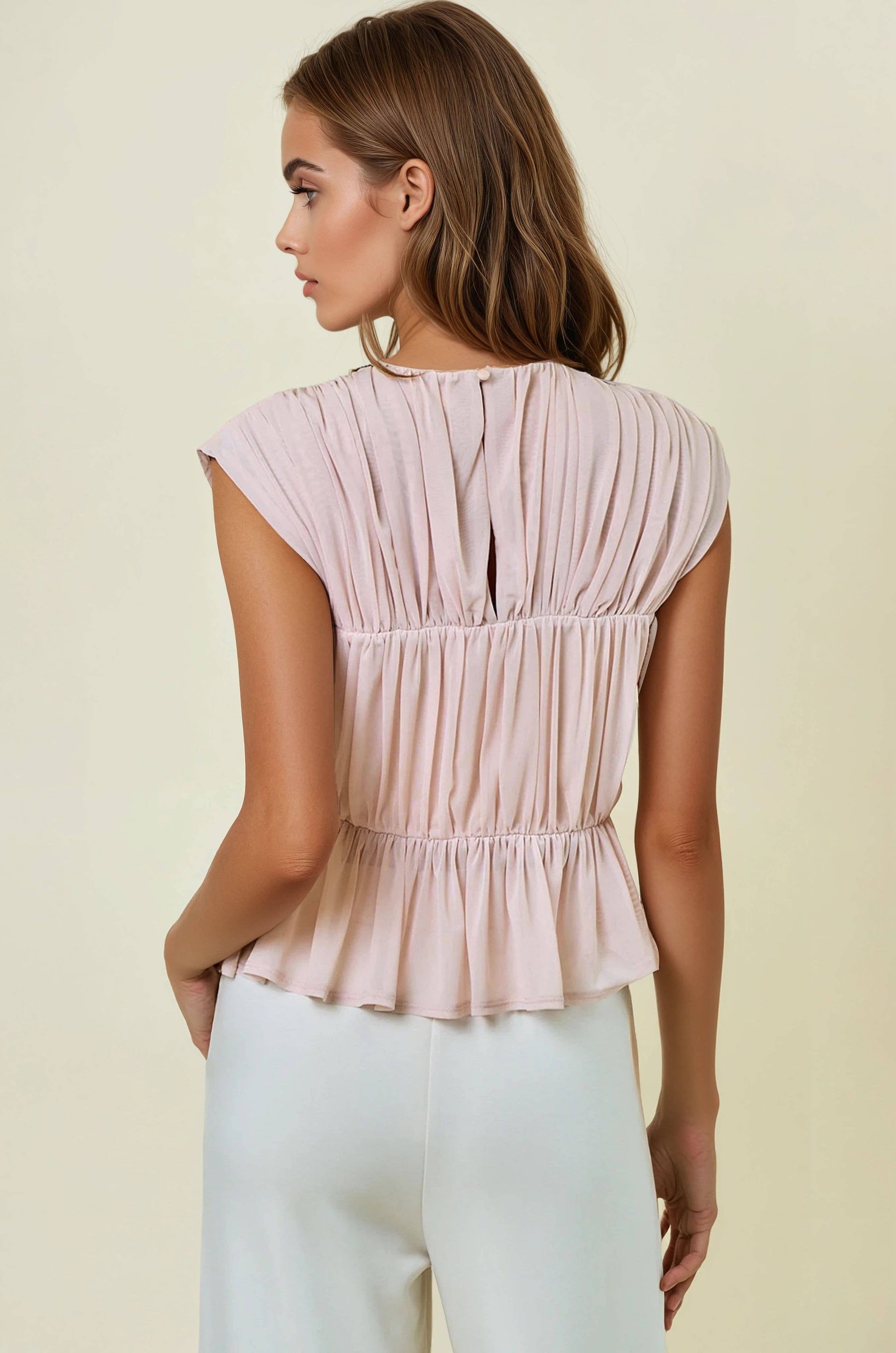 SEMI SHEER SHIRRED PEPLUM KNIT TOP