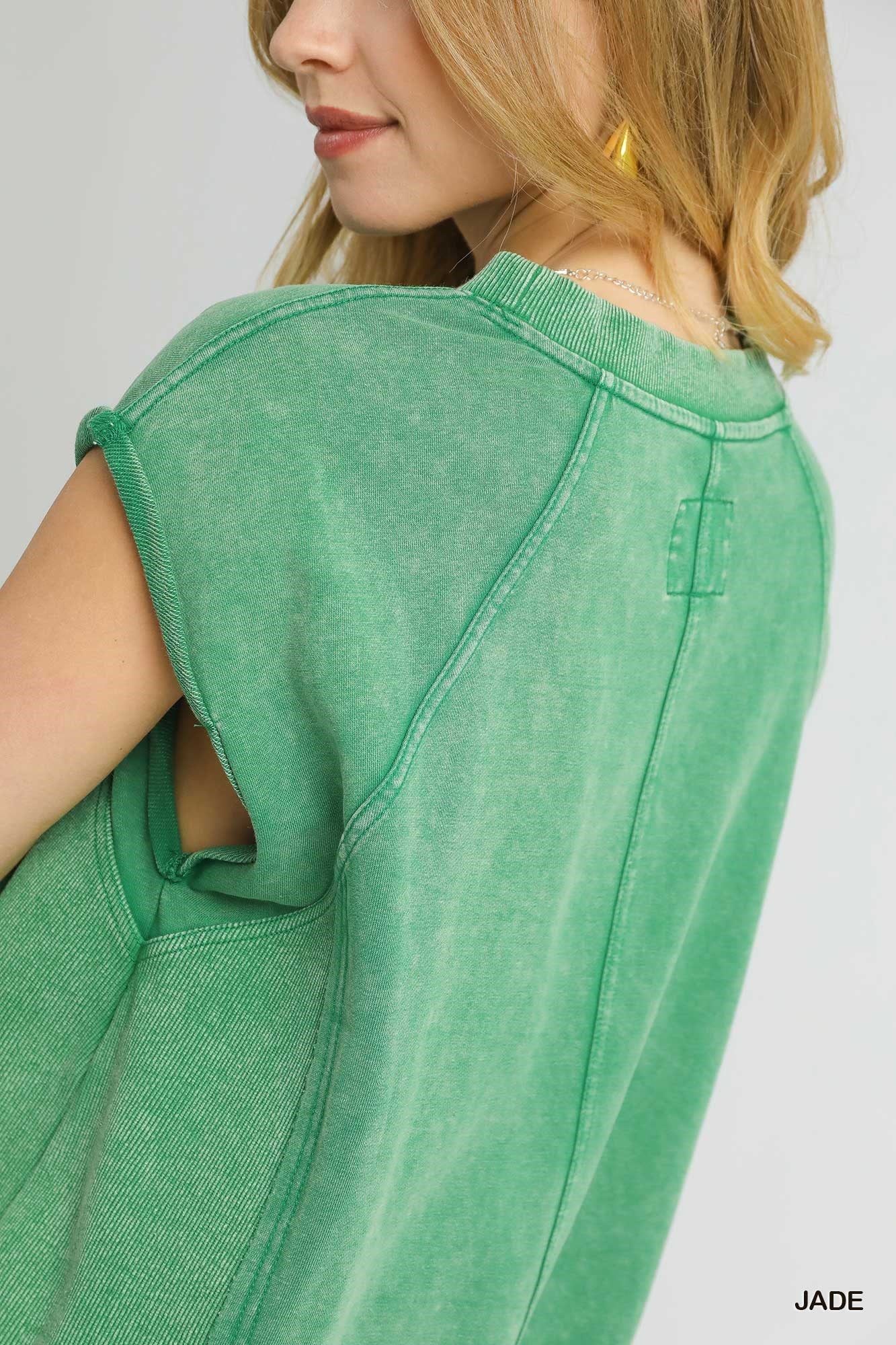 Sleeveless green sweatshirt