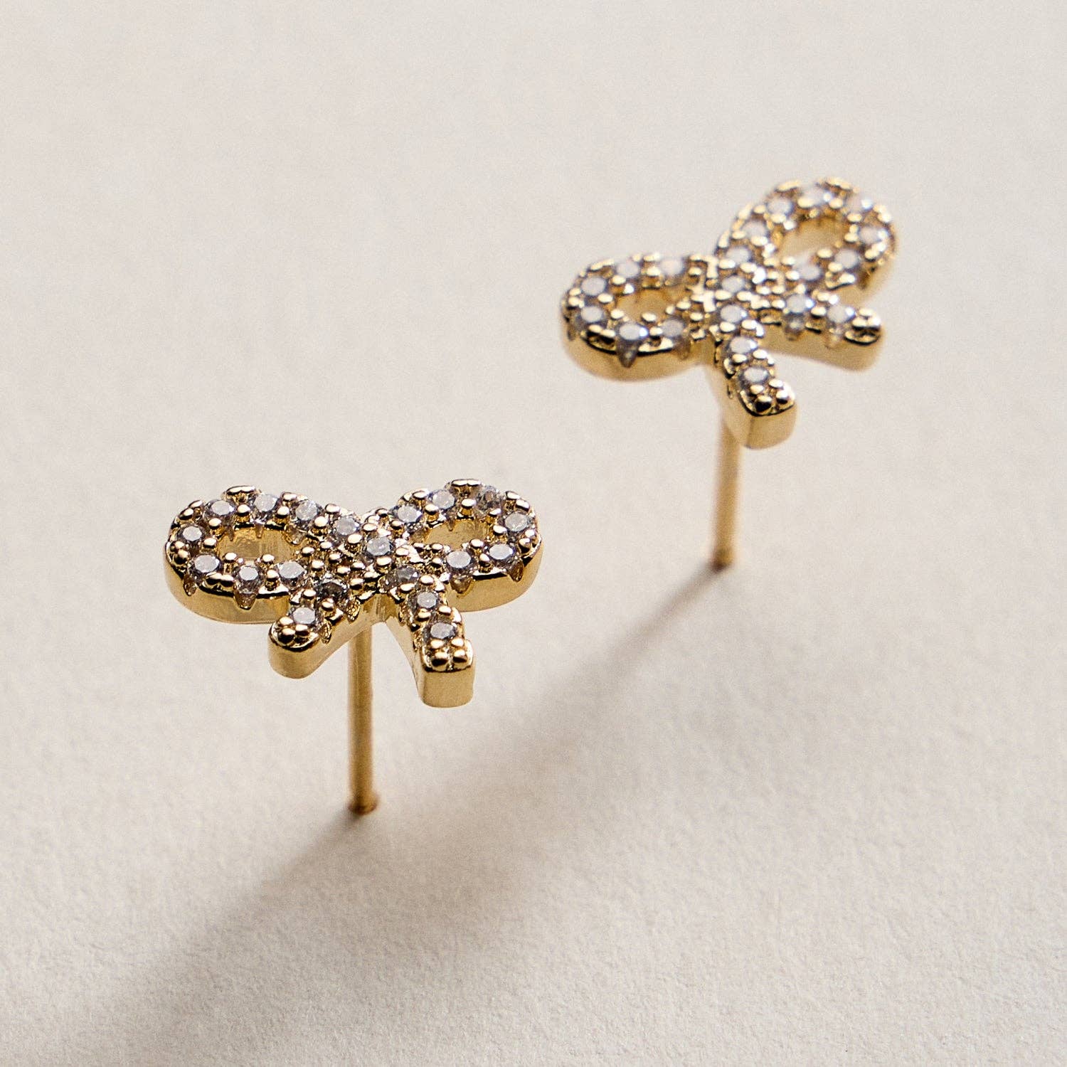 Gold Filled Bow Stud Earrings with Sparkling CZ Accents