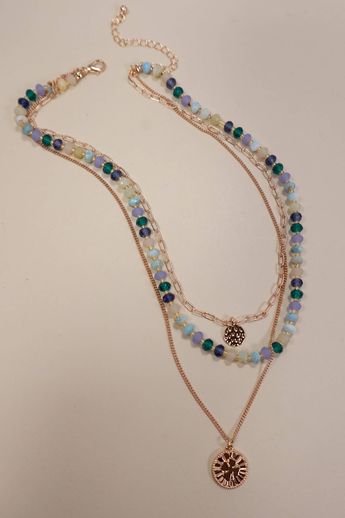 MULTI LAYERED BEADED CLOVER CHARM NECKLACE