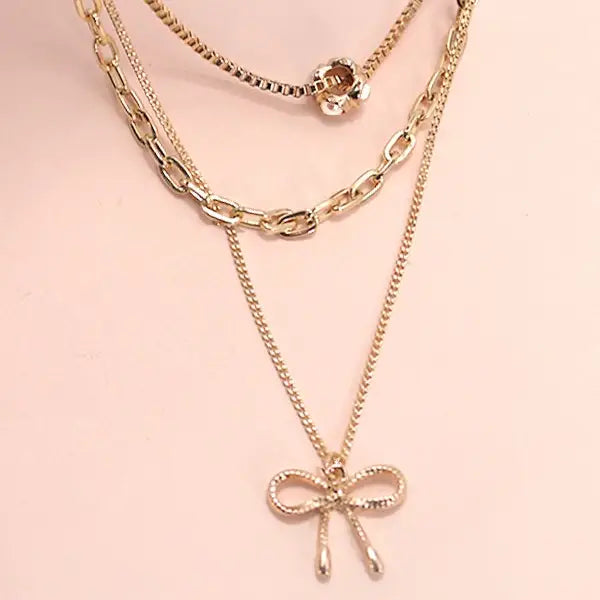 MULTI LAYER PEARL BOW CHARM NECKLACE