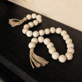LIGHT WOOD BEADS WITH JUTE TASSLES